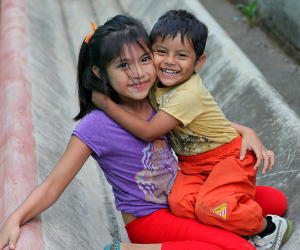 Two Nicaraguan kids hugging