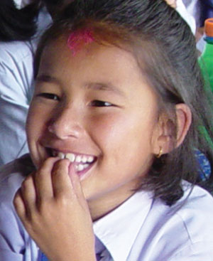 Nepal girl learning and smiling