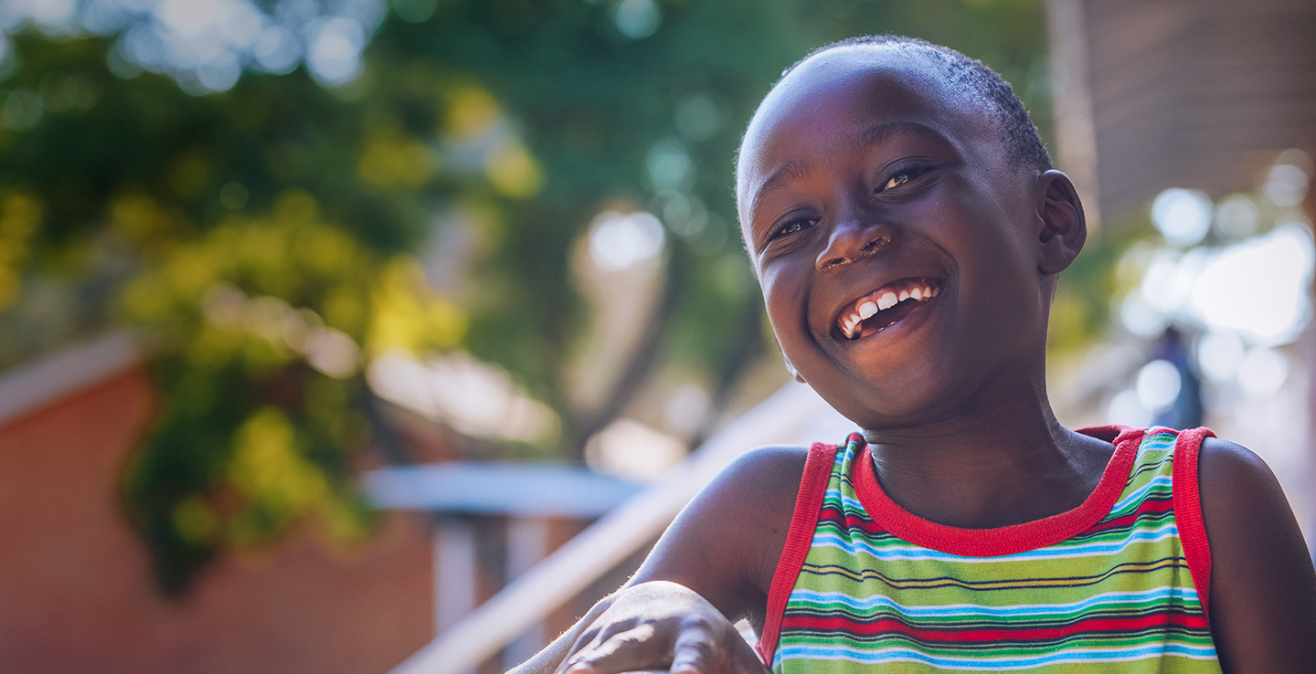 Child smiling in Zimbabwe