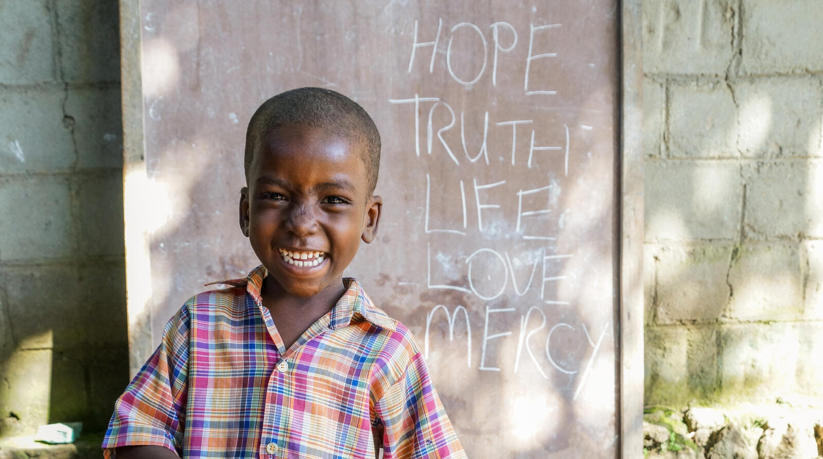 Little boy at a Hope Center in Haiti